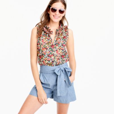 Man pulling women s tops down free image